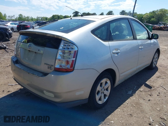 2006 Toyota Prius z VIN JTDKB20U667543175, wystawiony jako IAAI lot #42313159 z przebiegiem 277 637 mil mil oraz . Historia ofert i sprzedaży dostępna na DreamBid. Obrazek 4.