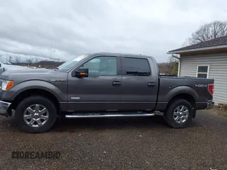 2014 Ford F-150 XL with VIN 1FTFW1ET8EFB75196, listed as a IAAI auction lot 41945260 with 319,194 mi miles. Bid and sale history available at carsss.com. Image 14.