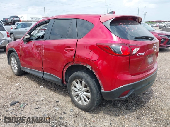 2016 Mazda CX-5 Sport with VIN JM3KE2BYXG0668401, listed as a IAAI auction lot 42370910 with Not provided miles and . Bid and sale history available at DreamBid. Image 3.