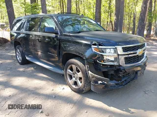 2015 Chevrolet Suburban LT with VIN 1GNSCJKC1FR264255, listed as a IAAI auction lot 42065176 with 115,861 mi miles. Bid and sale history available at carsss.com. Image 1.