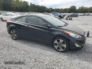 2013 Hyundai Elantra Coupe GS PZEV with VIN KMHDH6AE9DU007983, listed as a Copart auction lot 74776824 with 129,222 mi miles and Salvage Title. Bid and sale history available at carsss.com. Image 4.