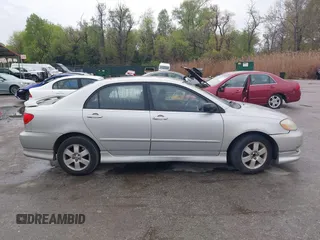 2003 Toyota Corolla CE with VIN 2T1BR32E13C038971, listed as a IAAI auction lot 42027458 with 227,808 mi miles. Bid and sale history available at carsss.com. Image 13.