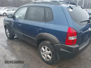 2005 Hyundai Tucson GLS with VIN KM8JN12DX5U134859, listed as a IAAI auction lot 41126546 with 215,110 mi miles. Bid and sale history available at carsss.com. Image 3.