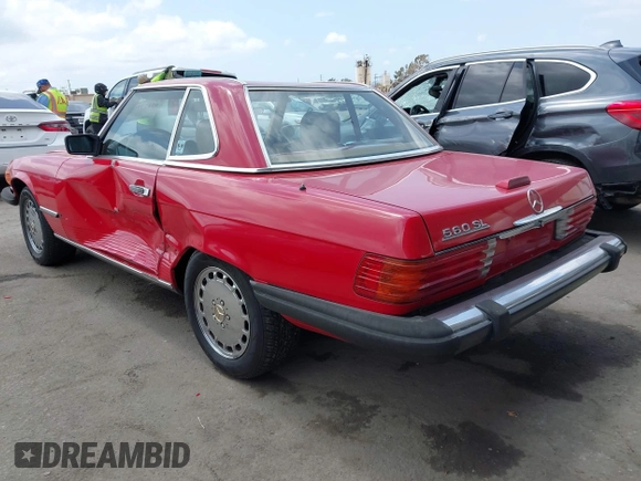 1988 Mercedes-Benz 560 with VIN WDBBA48D4JA090929, listed as a IAAI auction lot 42127701 with 186,443 mi miles. Bid and sale history available at carsss.com. Image 3.