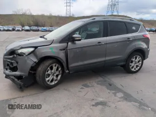 2014 Ford Escape Titanium with VIN 1FMCU9J97EUB30467, listed as a Copart auction lot 54949035 with 112,013 mi miles and Salvage Title. Bid and sale history available at DreamBid. Image 1.