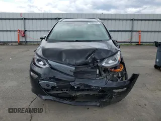 2018 Chevrolet Bolt EV Premier with VIN 1G1FX6S09J4122445, listed as a Copart auction lot 55230635 with 33,569 mi miles and Salvage title. Bid and sale history available at DreamBid. Image 5.
