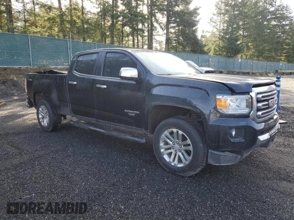 2015 GMC Canyon 4WD SLT with VIN 1GTG6CE37F1270301, listed as a Copart auction lot 47665365 with 135,300 mi miles and Salvage Title. Bid and sale history available at carsss.com. Image 4.