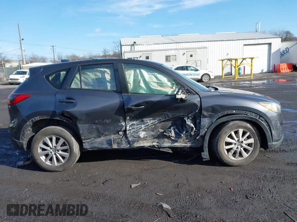 2015 Mazda CX-5 Sport with VIN JM3KE4BY1F0543507, listed as a IAAI auction lot 41530491 with 127,995 mi miles. Bid and sale history available at carsss.com. Image 13.