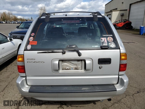 1998 Isuzu Rodeo S z VIN 4S2CK58W9W4302907, wystawiony jako Copart lot #48997335 z przebiegiem 162 858 mil mil oraz Szkoda całkowita • Salvage title. Historia ofert i sprzedaży dostępna na DreamBid. Obrazek 6.