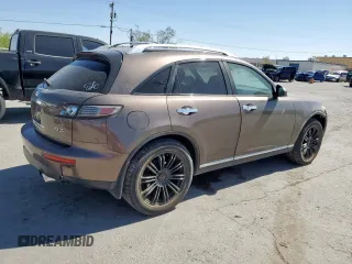 2008 Infiniti FX z VIN JNRAS08W38X203278, wystawiony jako Copart lot #57710405 z przebiegiem 168 007 mil mil oraz Szkoda całkowita • Salvage title. Historia ofert i sprzedaży dostępna na DreamBid. Obrazek 3.