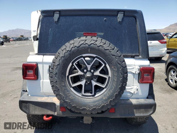 2024 Jeep Wrangler Rubicon with VIN 1C4PJXFG1RW300794, listed as a Copart auction lot 60173765 with 22,652 mi miles and Clean title. Bid and sale history available at DreamBid. Image 6.