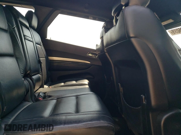 2014 Dodge Durango SXT z VIN 1C4RDJAG8EC455892, wystawiony jako Copart lot #57796095 z przebiegiem 98 251 mil mil oraz Szkoda całkowita • Salvage title. Historia ofert i sprzedaży dostępna na DreamBid. Obrazek 10.