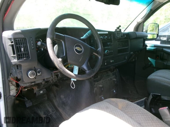 2011 Chevrolet Express Cargo with VIN 1GCWGFCB7B1123426, listed as a IAAI auction lot 42573299 with Not provided miles and . Bid and sale history available at DreamBid. Image 16.