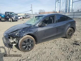 2025 Tesla Model Y Long Range with VIN 7SAYGDEE9SF224174, listed as a Copart auction lot 48988195 with 5,696 mi miles and Salvage Title. Bid and sale history available at DreamBid. Image 1.