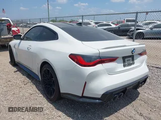 2021 BMW M4 with VIN WBS53AZ02MCH23791, listed as a IAAI auction lot 42318737 with 18,632 mi miles and . Bid and sale history available at DreamBid. Image 3.