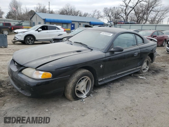 1997 Ford Mustang with VIN 1FALP4042VF198111, listed as a Copart auction lot 44245505 with 99,501 mi miles and Salvage Title. Bid and sale history available at carsss.com. Image 1.