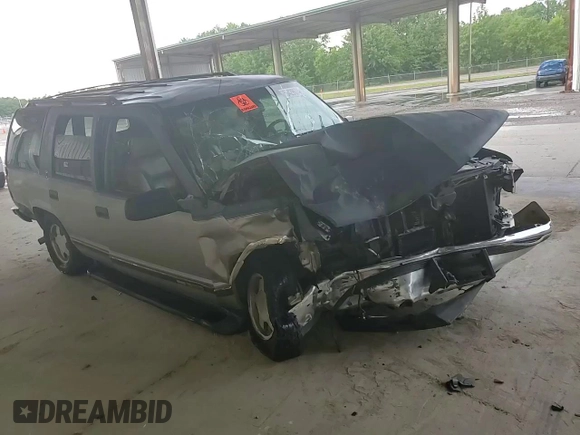 1999 GMC Yukon with VIN 1GKEC13R4XJ735246, listed as a Copart auction lot 56429874 with 258,616 mi miles and Salvage Title. Bid and sale history available at carsss.com. Image 12.