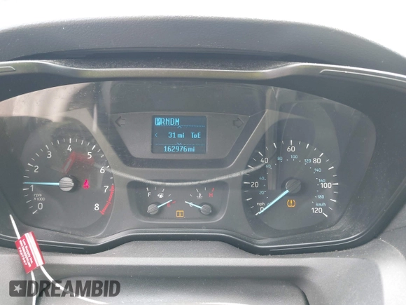 2016 Ford Transit Cargo z VIN 1FTYE1ZM9GKB14741, wystawiony jako IAAI lot #42165906 z przebiegiem 162 976 mil mil oraz . Historia ofert i sprzedaży dostępna na DreamBid. Obrazek 7.