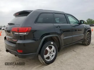 2019 Jeep Grand Cherokee Trailhawk with VIN 1C4RJFLG8KC613582, listed as a Copart auction lot 62901405 with 136,809 mi miles and Salvage title. Bid and sale history available at DreamBid. Image 3.