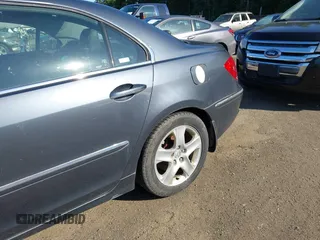 2005 Acura RL z VIN JH4KB16585C008623, wystawiony jako IAAI lot #42565681 z przebiegiem 218 757 mil mil oraz . Historia ofert i sprzedaży dostępna na DreamBid. Obrazek 6.