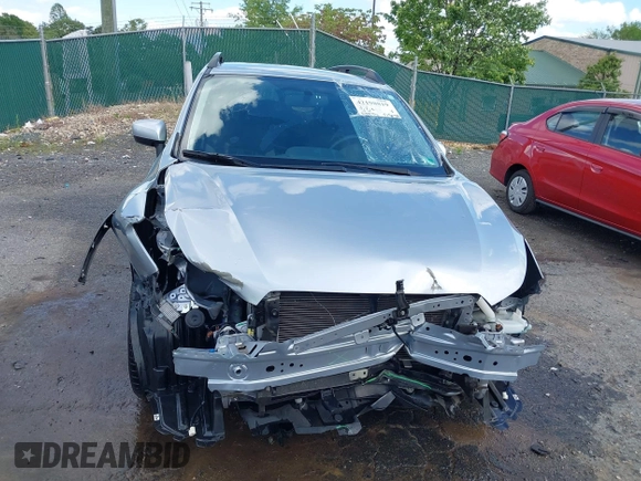 2016 Subaru Crosstrek Premium z VIN JF2GPABC5G8244005, wystawiony jako IAAI lot #42198819 z przebiegiem 42 273 mil mil oraz . Historia ofert i sprzedaży dostępna na DreamBid. Obrazek 6.