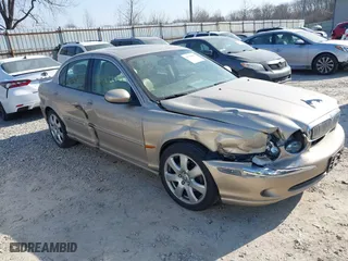 2005 Jaguar X-Type 3.0L with VIN SAJWA51C35WE25430, listed as a IAAI auction lot 41750587 with 100,392 mi miles. Bid and sale history available at carsss.com. Image 1.