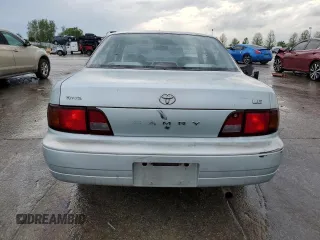 1995 Toyota Camry LE z VIN 4T1SK12E2SU617134, wystawiony jako Copart lot #54775365 z przebiegiem 305 046 mil mil oraz Szkoda całkowita • Salvage title. Historia ofert i sprzedaży dostępna na DreamBid. Obrazek 6.