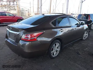 2015 Nissan Altima 2.5 SV with VIN 1N4AL3AP1FC169188, listed as a IAAI auction lot 41274644 with 82,222 mi miles. Bid and sale history available at carsss.com. Image 4.