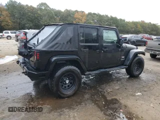 2008 Jeep Wrangler Unlimited Sahara with VIN 1J4GA59148L574934, listed as a Copart auction lot 74590164 with 134,674 mi miles and Salvage title. Bid and sale history available at DreamBid. Image 3.