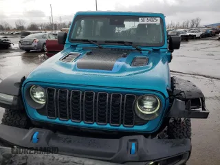 2024 Jeep Wrangler Rubicon X z VIN 1C4RJXR6XRW217098, wystawiony jako Copart lot #50154025 z przebiegiem 15 887 mil mil oraz Czysty tytuł • Clean title. Historia ofert i sprzedaży dostępna na DreamBid. Obrazek 5.