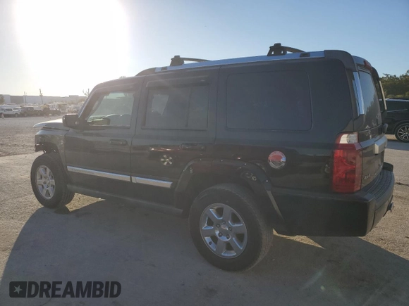 2007 Jeep Commander Overland with VIN 1J8HG68217C619277, listed as a Copart auction lot 82934414 with 136,282 mi miles and Salvage title. Bid and sale history available at DreamBid. Image 2.
