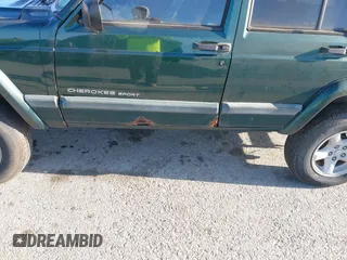 1999 Jeep Cherokee Sport with VIN 1J4FF68SXXL677013, listed as a IAAI auction lot 41993355 with 228,722 mi miles. Bid and sale history available at carsss.com. Image 6.