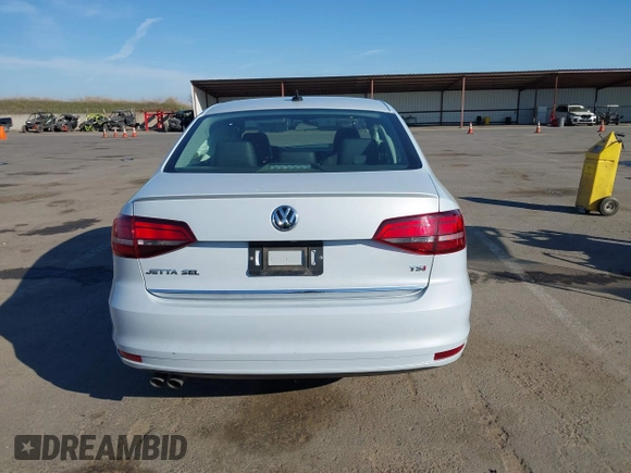 2018 Volkswagen Jetta SEL с VIN 3VWL17AJ2JM252094, выставлен на аукционе IAAI как лот 41397575 с пробегом 57 983 миль миль и . История ставок и продаж доступна на DreamBid. Изображение 16.
