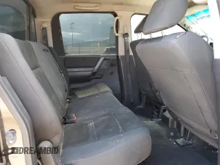 2012 Nissan Titan SV z VIN 1N6AA0EK1CN302199, wystawiony jako Copart lot #63037615 z przebiegiem 184 330 mil mil oraz Szkoda całkowita • Salvage title. Historia ofert i sprzedaży dostępna na DreamBid. Obrazek 10.