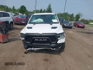 2022 Ram 1500 Rebel with VIN 1C6SRFLT5NN318494, listed as a IAAI auction lot 42413194 with 59,458 mi miles and . Bid and sale history available at DreamBid. Image 12.
