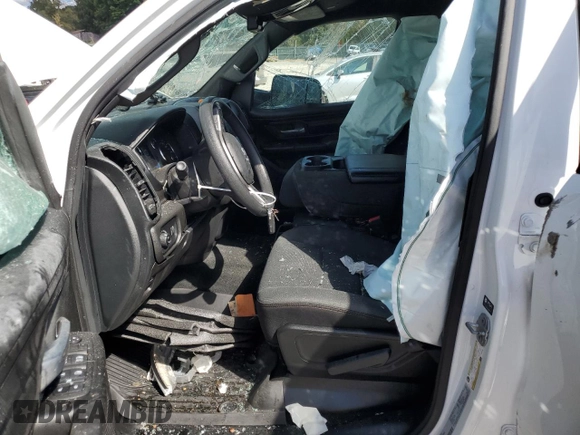 2022 Ram 1500 Tradesman with VIN 1C6SRFGT0NN269943, listed as a Copart auction lot 76373904 with 59,511 mi miles and Salvage title. Bid and sale history available at DreamBid. Image 7.