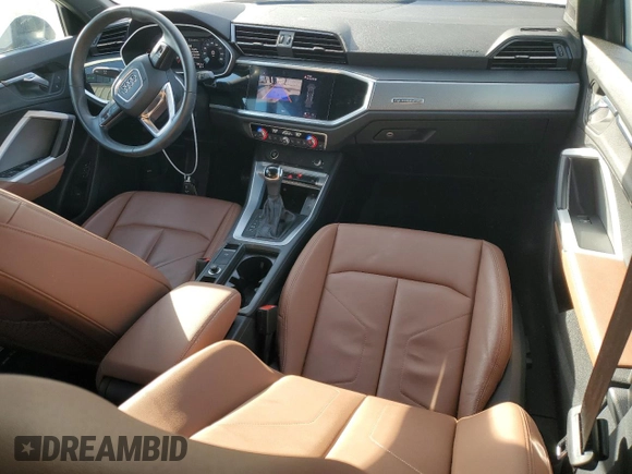 2022 Audi Q3 Premium with VIN WA1AUCF32N1001495, listed as a Copart auction lot 83381104 with 24,682 mi miles and Salvage Title. Bid and sale history available at carsss.com. Image 8.