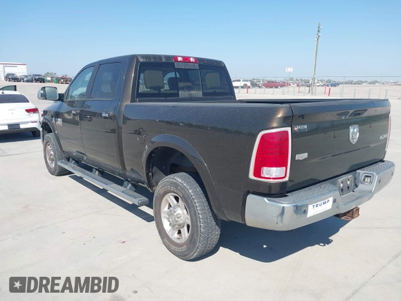 2013 Ram 2500 Laramie with VIN 3C6UR5FL7DG529590, listed as a IAAI auction lot 40608177 with 141,594 mi miles and . Bid and sale history available at DreamBid. Image 3.