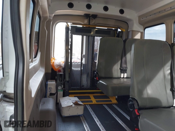2023 Ford Transit Cargo with VIN 1FTBR1C86PKA52494, listed as a IAAI auction lot 40740671 with 9,999 mi miles and . Bid and sale history available at DreamBid. Image 17.