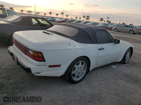 1990 Porsche 944 with VIN WP0CB2949LN481351, listed as a Copart auction lot 75335194 with 70,964 mi miles and Salvage title. Bid and sale history available at DreamBid. Image 3.