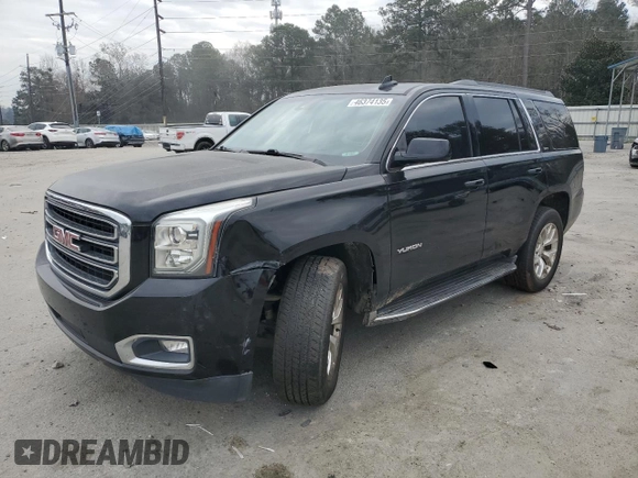 2015 GMC Yukon SLT with VIN 1GKS1BKC1FR615562, listed as a Copart auction lot 46374135 with 141,207 mi miles and Salvage Title. Bid and sale history available at carsss.com. Image 1.