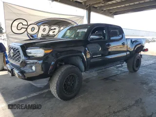 2020 Toyota Tacoma SR5 with VIN 3TMDZ5BN5LM082872, listed as a Copart auction lot 58534065 with 50,764 mi miles and Salvage title. Bid and sale history available at DreamBid. Image 1.