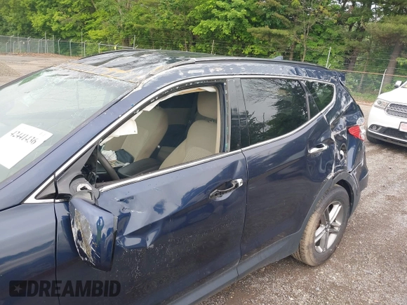 2017 Hyundai Santa Fe 2.4L z VIN 5XYZUDLB9HG421284, wystawiony jako IAAI lot #42441436 z przebiegiem 96 155 mil mil oraz . Historia ofert i sprzedaży dostępna na DreamBid. Obrazek 6.