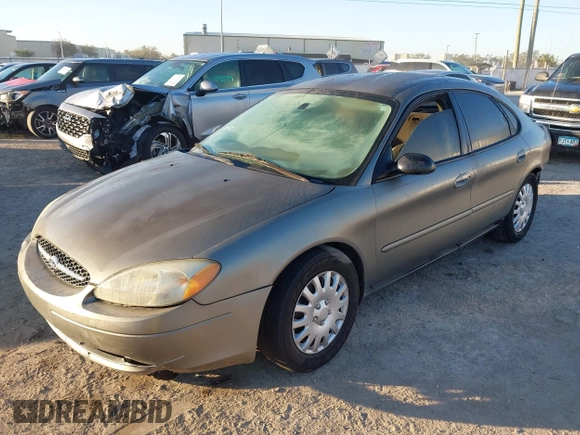 2003 Ford Taurus LX Standard with VIN 1FAFP52U33A235063, listed as a IAAI auction lot 41777293 with 164,125 mi miles and . Bid and sale history available at DreamBid. Image 2.
