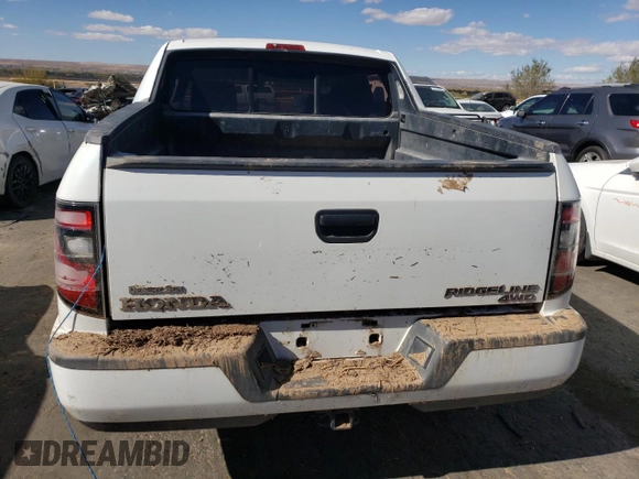 2012 Honda Ridgeline Sport z VIN 5FPYK1F72CB451788, wystawiony jako Copart lot #77704254 z przebiegiem 153 788 mil mil oraz Szkoda całkowita • Salvage title. Historia ofert i sprzedaży dostępna na DreamBid. Obrazek 6.