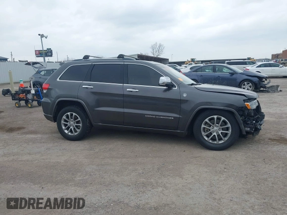 2015 Jeep Grand Cherokee Overland with VIN 1C4RJFCT3FC131122, listed as a IAAI auction lot 41513892 with 125,765 mi miles. Bid and sale history available at carsss.com. Image 13.