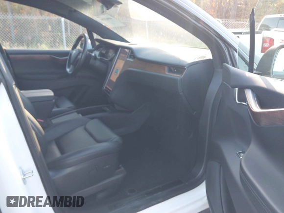2020 Tesla Model X Long Range with VIN 5YJXCDE28LF298553, listed as a IAAI auction lot 40863184 with 54,031 mi miles and . Bid and sale history available at DreamBid. Image 5.