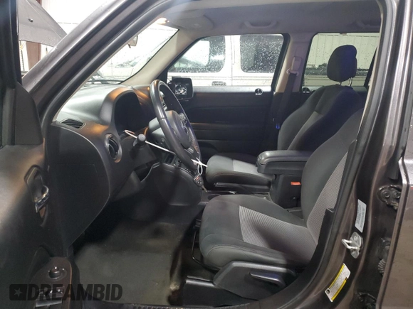 2015 Jeep Patriot High Altitude with VIN 1C4NJRFB2FD386115, listed as a Copart auction lot 56503115 with 126,407 mi miles and Salvage title. Bid and sale history available at DreamBid. Image 7.