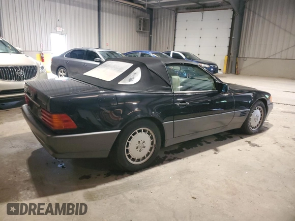 1992 Mercedes-Benz 500 z VIN WDBFA66E5NF040865, wystawiony jako Copart lot #57905205 z przebiegiem 95 158 mil mil oraz Tytuł czysty. Historia ofert i sprzedaży dostępna na DreamBid. Obrazek 3.