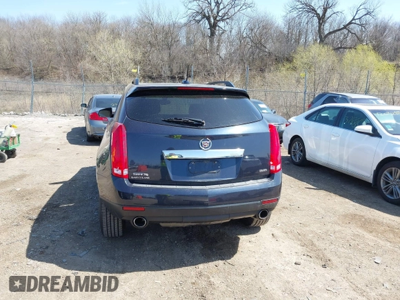 2015 Cadillac SRX with VIN 3GYFNAE39FS571065, listed as a IAAI auction lot 42029749 with 146,098 mi miles and . Bid and sale history available at DreamBid. Image 16.